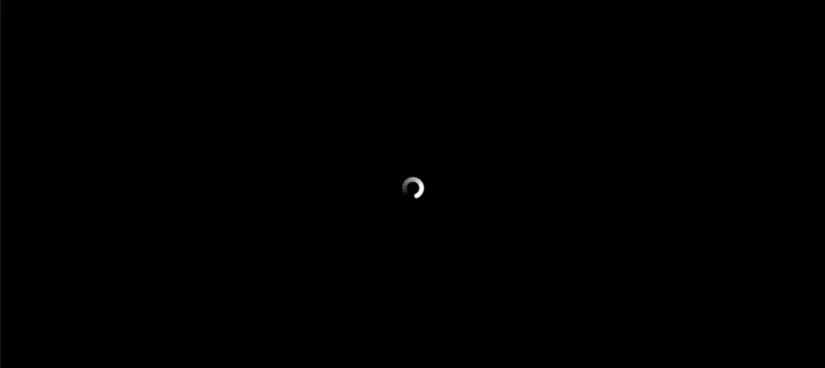 VNC コンソールに表示された、黒い画面にローディングアイコンだけが回り続ける起動画面